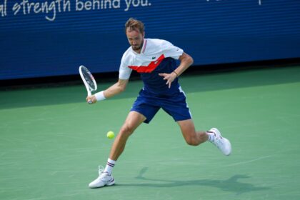 Daniil Medvedev returns a shot during a victory over Lorenzo Musetti at the ATP Cincinnati Masters tournament