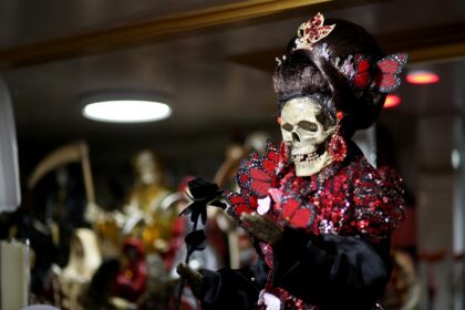 Santa Muerte, or Saint Death, is often portrayed carrying a scythe, a globe or a rose -- and is said to derive special powers depending on her clothing and other characteristics