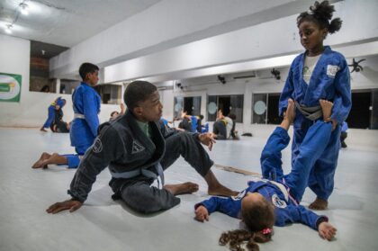 Students attend a jiujitsu class at the Cantagalo Jiu-Jitsu gym in Rio de Janeiro, Brazil