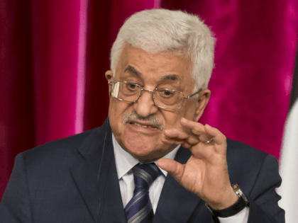 In this Sept. 19, 2014 file photo, Palestinian President Mahmoud Abbas gestures as he speaks during a media conference at the Elysee Palace in Paris. The Hamas militant group on Sunday, Sept. 7, 2017, said it has accepted key conditions demanded by its rival, President Mahmoud Abbas, including nationwide elections …